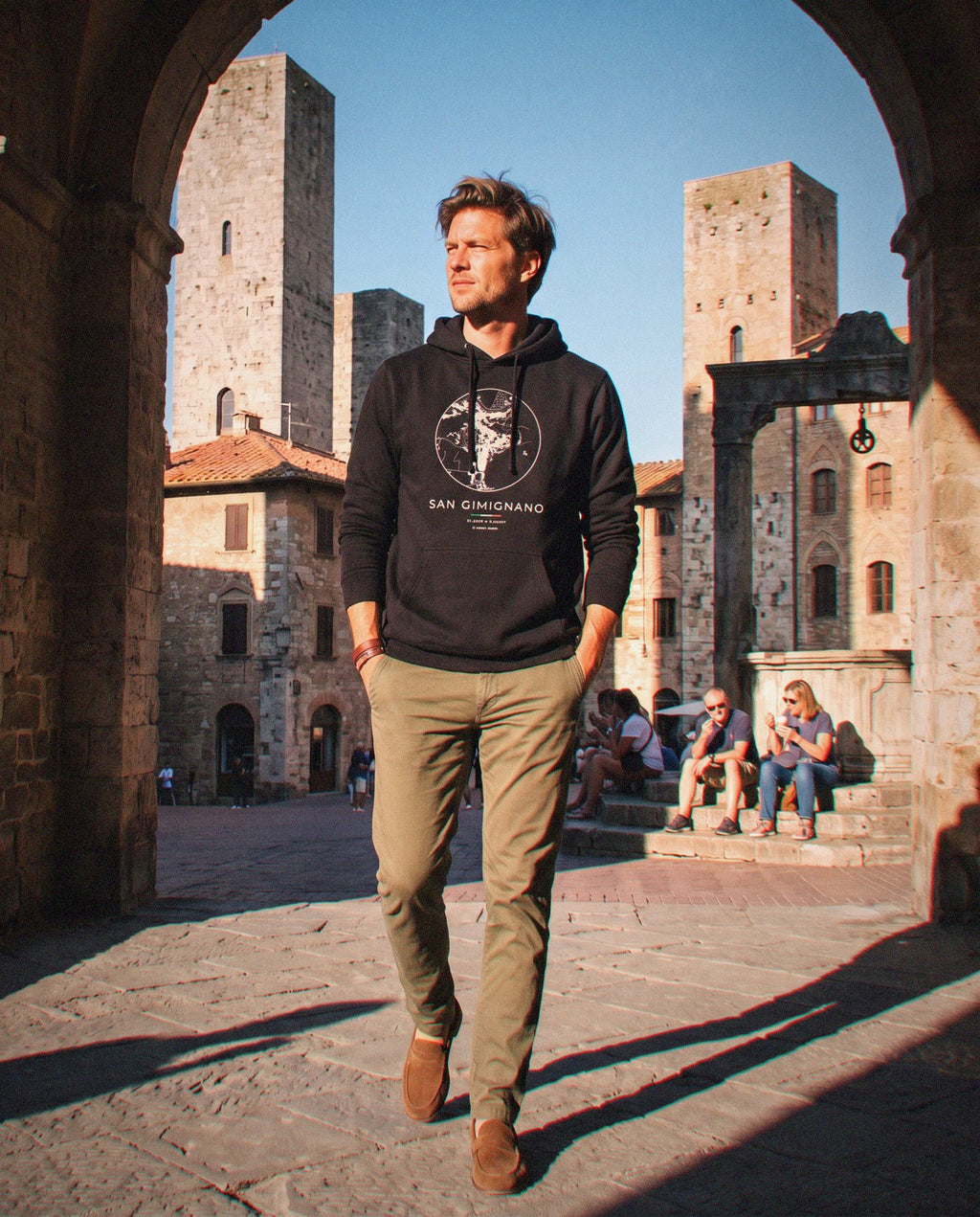 San Gimignano map hoodie in Black, circle street map of San Gimignano, worn in San Gimignano. Postmark.